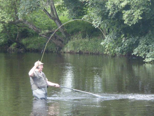 Martin Busk nets a sea trout in Tyndals: June 2009